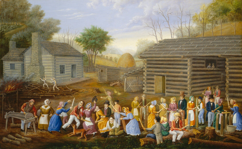 This painting depicts a rural scene with people gathered in front of log cabins. Hills, sparse trees, and a haystack are visible in the background under a partly cloudy sky. In the distance on the left, two people stand on a pile of logs, a small fire breaking out on the far left and putting gray smoke in the air. Closer to us on the left, a man stands by a machine made of several horizontal rods, appearing to feed long strands of fiber or grain into it. Gathered in a line across the rest of the painting is a crowd of men and women, appearing to hold long, flat objects and bundles of thin fiber. Some of the people talk while others seem to dance. The people all have pale skin, and the women wear colorful dresses with aprons and bonnets, while the men wear jackets, vests, and top hats.