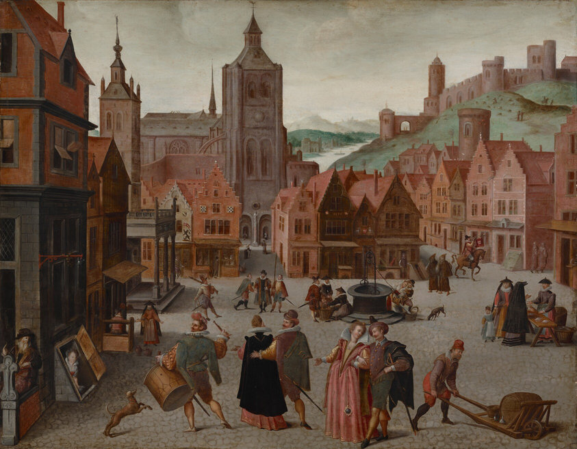 We look slightly down onto a scene with people gathering in small groups in a cobblestone town square lined with rows of brick, wood, and stone buildings, many with stepped rooflines, in this horizontal painting. Singly or in pairs or trios, men, women, and children walk across the square, move goods around, or talk to merchants. All the people have light skin. Many of the men have mustaches and wear hats, and some carry swords. In tones of black, olive green, brick red, and plum purple, they wear hip-length cloaks over jackets, with white collars or ruffs and brass buttons, and knee-length breeches over yellow or black stockings. The women all wear long dresses in salmon pink, coral red, or golden yellow, with white collars or ruffs, and many wear black, ankle-length cloaks, some with hoods. Closest to us, a sumptuously dressed man and woman walk toward us while another similarly elegant couple walks away. Also facing away from us, to our left, a man wearing a large drum strapped around his waist raises one drumstick as he looks over his left shoulder. Nearby, a woman peers up out of a cellar door that opens on an angle to the street. More couples gather around a well across the square, and two women and a child talk to a third woman selling wares at a wooden table to our right. A pair of hooded priests or monks walk near a man blowing on a trumpet on horseback. The buildings are mostly shades of brick red and brown, and most have three or four stories with steeply pitched roofs. More people walk along side streets leading off the main square. One gap in the buildings across from us leads to a nickel-gray stone church with a pointed spire and square tower. A grassy, green hill rises steeply beyond the buildings to our right, leading down to a waterway that extends up and away into the distance. A few boats float in the water, which reflects the leaden-gray sky. Beyond the town square, a brown stone structure like a fortress with turret towers and crenellated walls looms along the ridge of the hill to our right. Tiny in scale, people on horseback and tending sheep dot the hillside below. The date “1590” is painted on the front of one of the buildings across from us while another date, “1597,” is painted on the end of a short wall near the lower left corner.