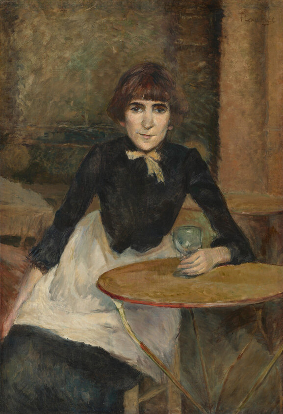 This painting shows a woman sitting at a round table. She has fair skin, sharp cheekbones, thick eyebrows, and pale lips with one side of her mouth raised in a partial smile. She has short brown hair with bangs across her forehead. She is wearing a black dress with a high collar, a pale yellow bow around her neck, and a white apron over her lap. In her hand, she holds a small, translucent glass that rests on the table. The background is a blurred blend of earthy tones, including brown, gray, and dark green, which suggest a wall behind her. The brushstrokes in the painting are thick and visible.