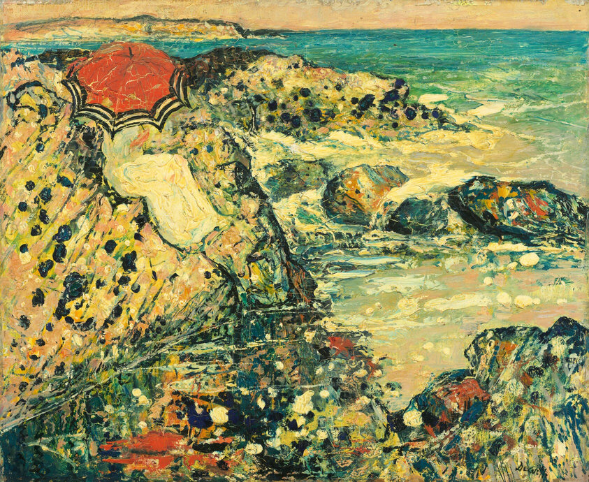 The painting depicts a rocky coastline dotted with color. The horizon is high in the scene, and a strip of pale-yellow sky is visible at the very top of the painting. Along the rocky coast in the distance, the colorful land meets vivid turquoise and green ocean waters, with white lines indicating small waves. A red-striped umbrella in the top left corner appears to shelter a person in a long white dress; the umbrella obscures their face. The rocks have been painted with thick dots of black, white, yellow, orange, red, and green. The brushstrokes are expressive and the paint has been thickly applied in dots and dashes.