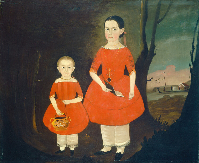 The image shows two children, a girl and a boy, depicted from head to toe. The girl is standing to the right, slightly turned towards the boy. She has dark hair tied back with a pink ribbon, and her facial features are serious with a fair complexion. The boy also has a fair complexion and short light-colored hair. They are both wearing matching red dresses with white lace collars and cuffs, and white pantalettes underneath. The boy holds a yellow ceramic jug decorated with a floral pattern, while the girl holds an open book in her hands. Around the girl's neck hangs a long chain with a circular pendant. The background features a dark, wooded area with bare trees, and in the distance, there is the silhouette of a house with smoke coming from the chimney, set against a pink and blue sky.