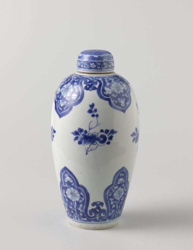 Ovoid covered jar with flower scrolls in lappet borders