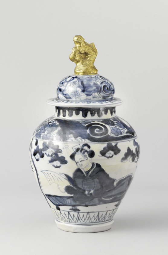 Ovoid covered jar with a woman reading a letter and finial in the shape of a shishi