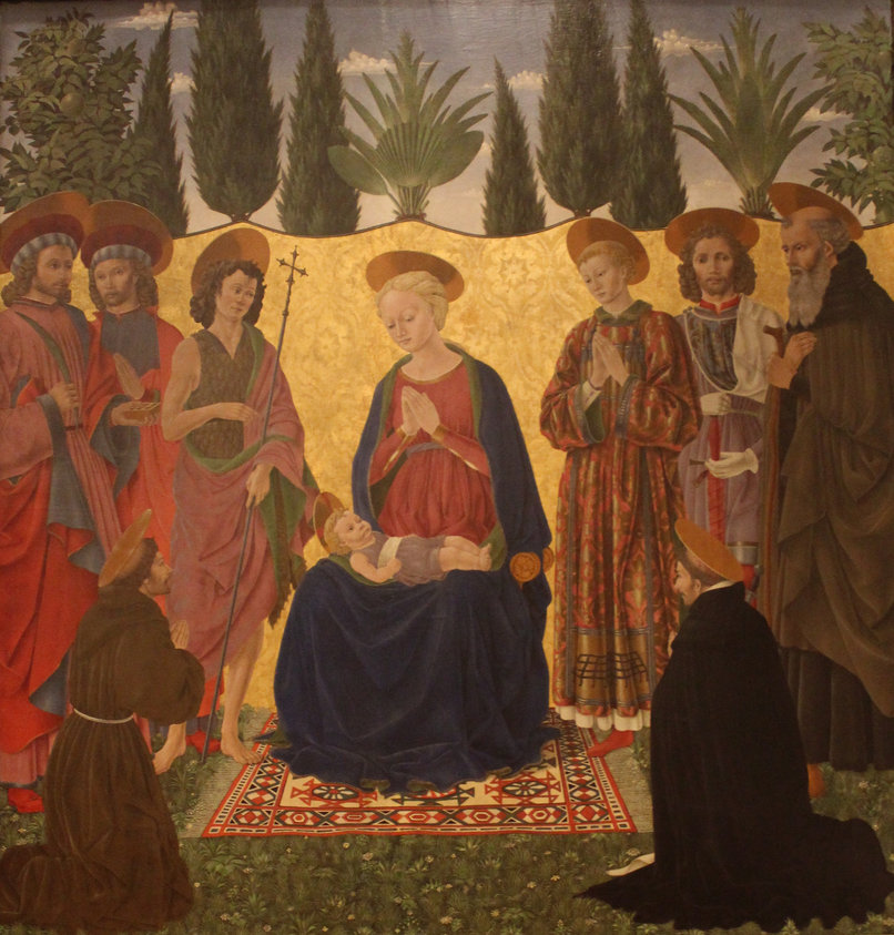 La pala fu commissionata per la cappella della villa medicea di Cafaggiolo,ristrutturata da Michelozzo nel 1451. Il Wedgwood Kennedy ipotizza una commissione da parte di Piero il Gottoso, per il quale il Baldovinetti aveva giá lavorato nella cappella della SS. Annunziata e, forse, in quella di S. Croce. Lo studioso suggerisce una datazione per la committenza al 1453, anno di nascita di Giuliano, secondogenito di Piero, avvalorata dalla presenza di San Giuliano insieme agli altri santi "medicei".